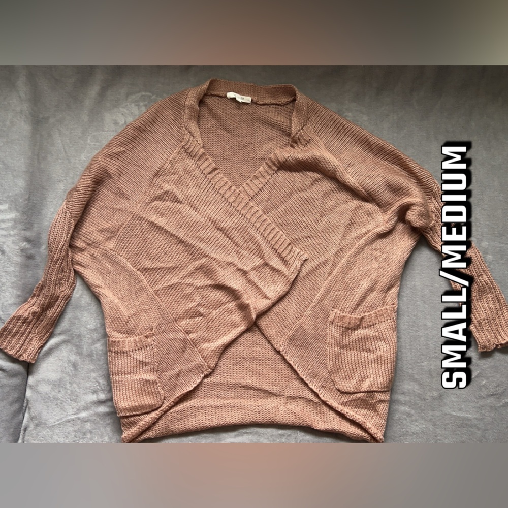 Cream/tan colored cardigan. Small/medium.